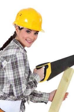 Woman sawing plank clipart