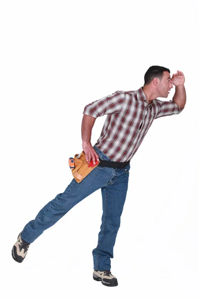 Handyman looking into the distance — Stock Photo, Image
