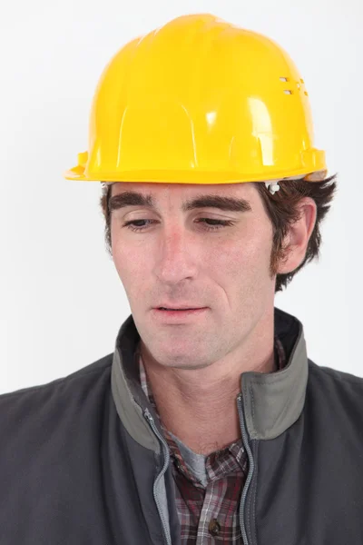 Head and shoulders portrait of pensive craftsman — Stock Photo, Image