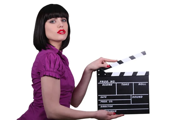 Sexy vrouw met bioscoop klappen, studio opname — Stockfoto