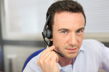 Man wearing a headset clipart