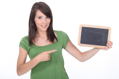 Woman pointing a slate clipart