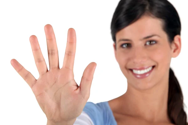 Woman holding out hand — Stock Photo, Image