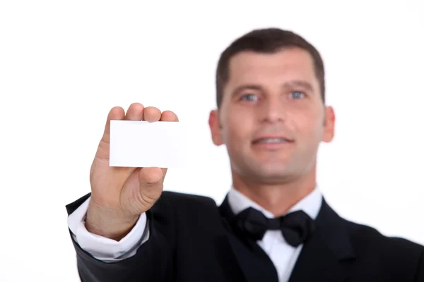 Gentleman showing businesscard — Stock Photo, Image