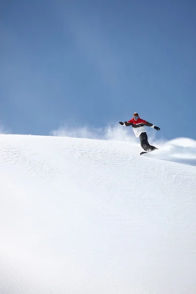 Snowboarder mutató-off — Stock Fotó