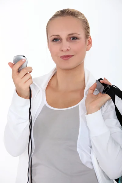 Young woman with stop watch — Stock Photo, Image