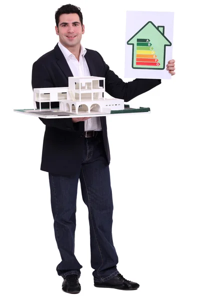 Architect with an energy rating sign — Stock Photo, Image