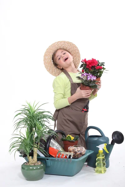 Junges Mädchen als Floristin verkleidet — Stockfoto