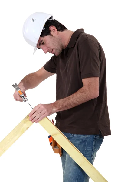 Makin fazendo moldura de madeira — Fotografia de Stock