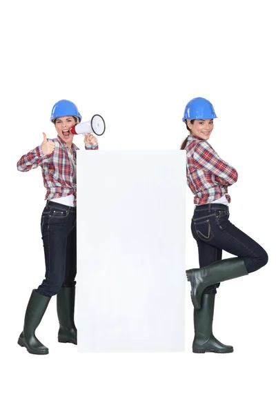 A female construction splitting herself in two. — Stock Photo, Image