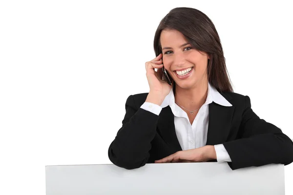 stock image Behind the counter with the mobile