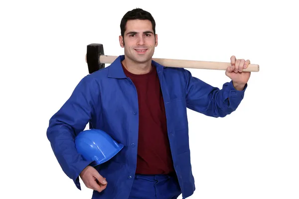 Homem posando com martelo de trenó — Fotografia de Stock