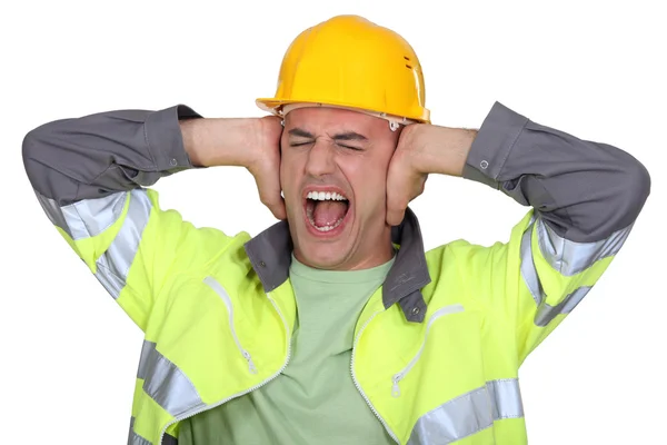 Workers covered their ears — Stock Photo, Image