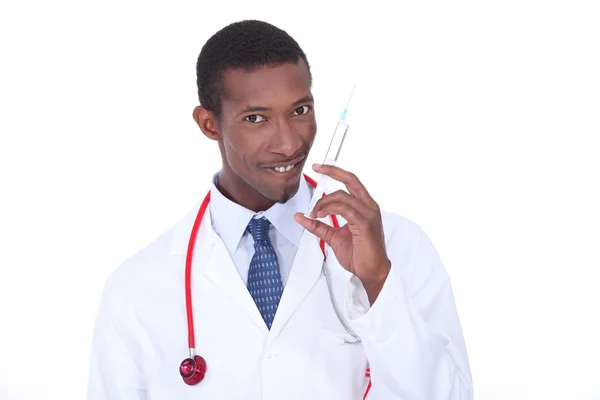 Syringe in hand — Stock Photo, Image