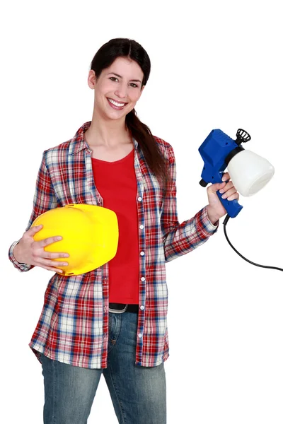 Decorator with a paint gun — Stock Photo, Image