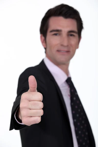 Бізнесмен дає великий палець вгору — стокове фото