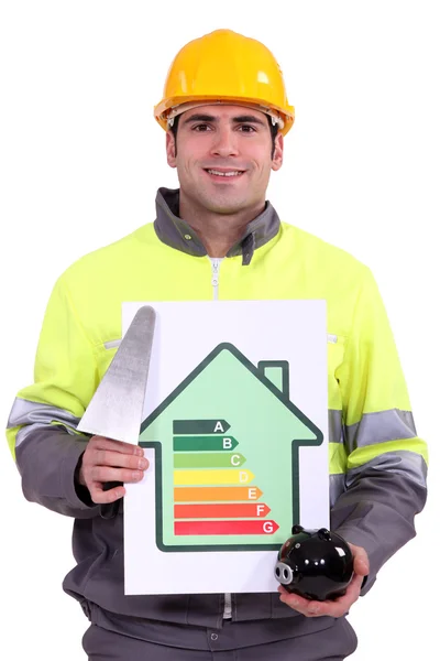 Builder with a plan to save energy — Stock Photo, Image