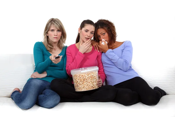 Girls watching a sad film — Stock Photo, Image