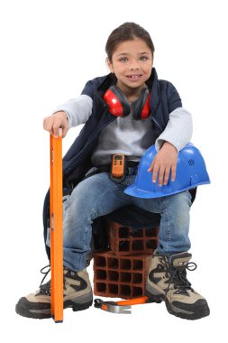 A little girl construction worker. clipart