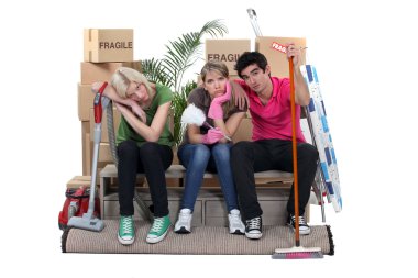 Roommates exhausted on moving day clipart