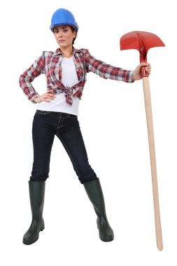Cute female bricklayer holding shovel clipart
