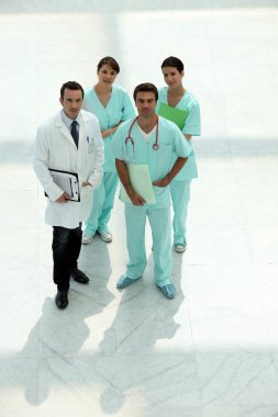 Medical team looking up clipart