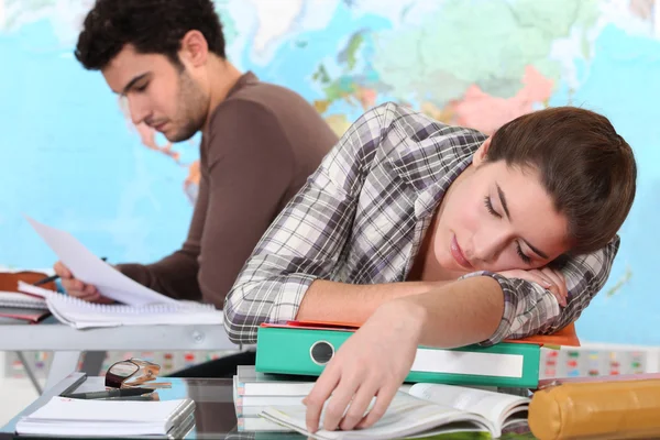 Student sleeping on her desk — Stock Photo, Image