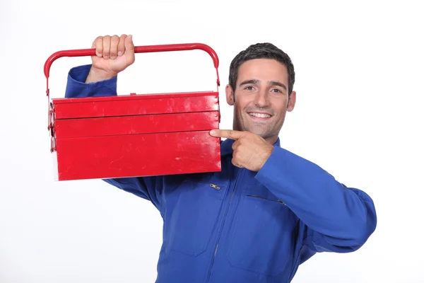 Man pointing to his toolbox — Stock Photo, Image