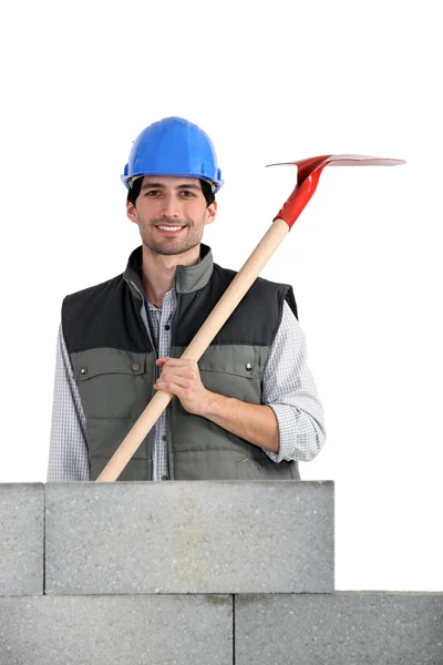 Construtor com uma pá — Fotografia de Stock