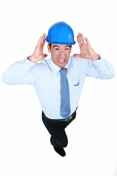 Man with helmet and unbearable noise — Stock Photo, Image