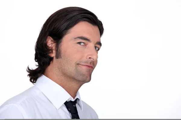 Närbild av en man i en skjorta och slips — Stockfoto