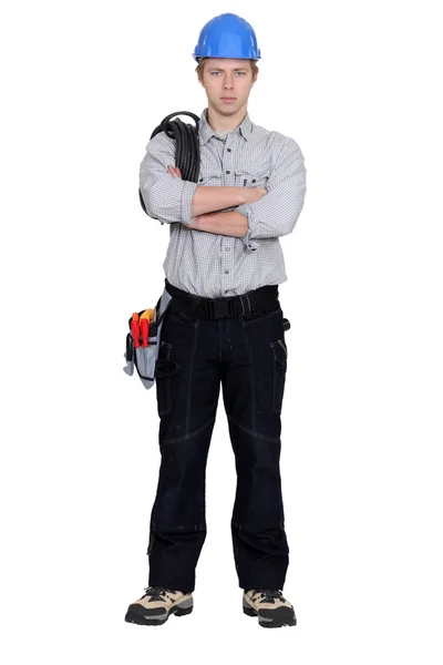 Angry tradesman with crossed arms — Stock Photo, Image