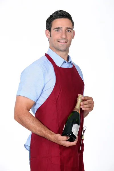 Kelner oferuje butelki szampana — Zdjęcie stockowe