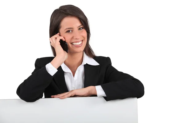 Smiling woman on the phone — Stock Photo, Image