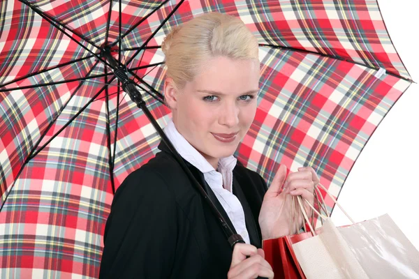Portrait of a young woman with umbrella — Stock Photo, Image