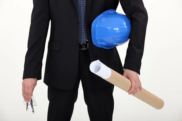 Architect protecting plans in a tube — Stock Photo, Image