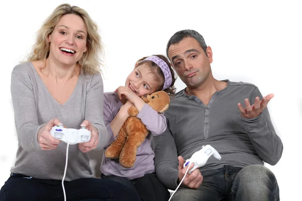 Family playing video games — Stock Photo, Image