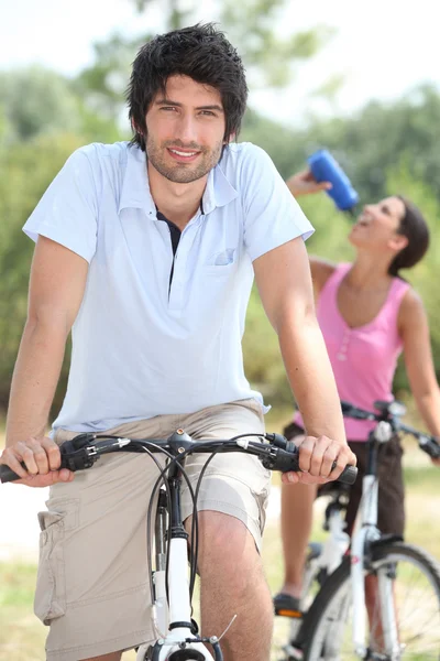 Couple on bicycle — Stock Photo, Image