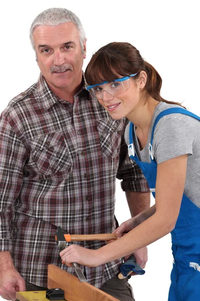 Carpenter and apprentice — Stock Photo, Image