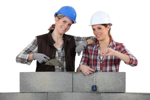 Dwa kobiece murarzy — Zdjęcie stockowe
