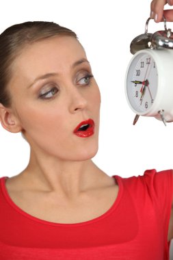 Woman has realized she is late clipart