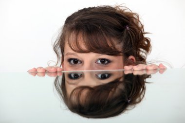 Mirror image of a woman clipart