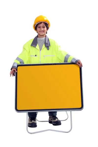 Mladý chlapec, oblečený jako stavební dělník — Stock fotografie