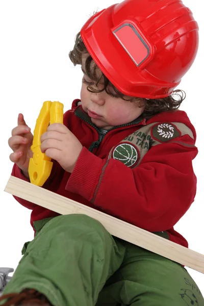 Kleine jongen gekleed een arbeider — Stockfoto