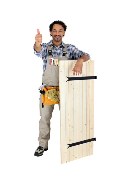Carpinteiro dando o polegar para cima — Fotografia de Stock