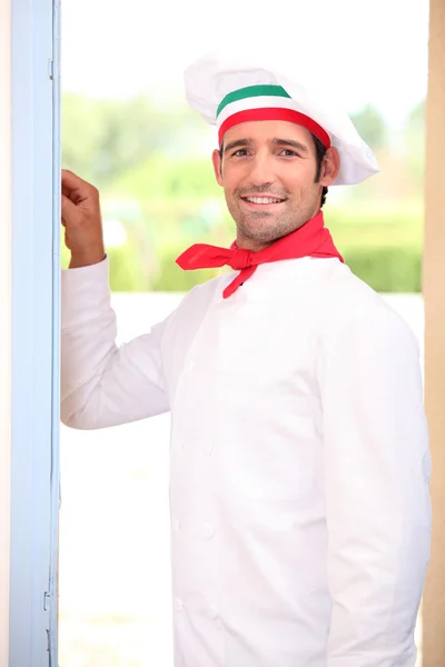 Cook knocking at the door — Stock Photo, Image