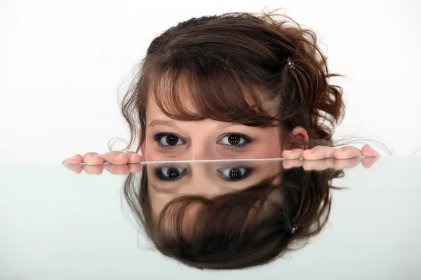 Mirror image of a woman — Stock Photo, Image
