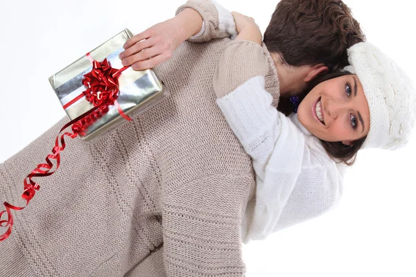 Woman happy with her surprise gift — Stock Photo, Image