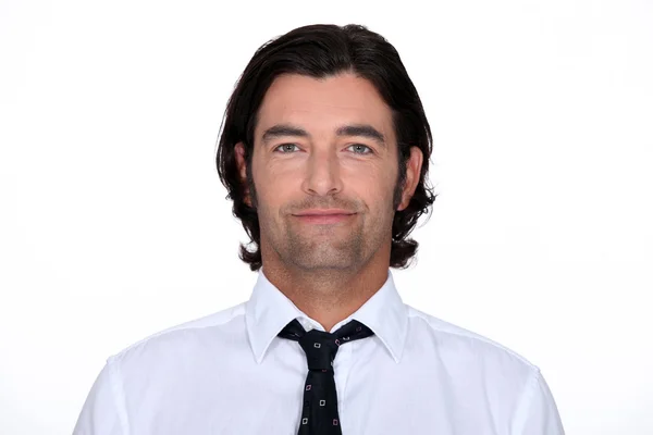 Huvudet och axlarna av en man i en skjorta och slips — Stockfoto
