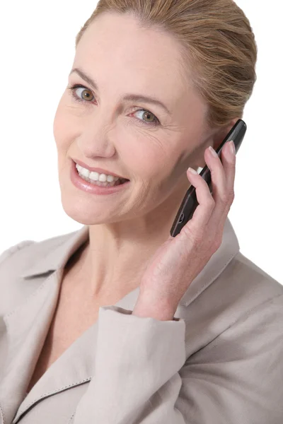 Smiling businesswoman on the phone Stock Photo